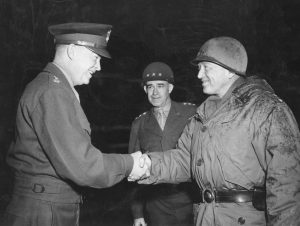 General Eisenhower with Omar Bradley (center) and George Patton (right). Ike was well known for his ability to work with anybody.